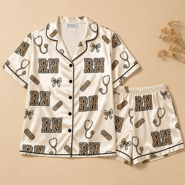 RN Leopard Print Varsity Bow Cream Satin Pajama Set - Short Style Flat Lay