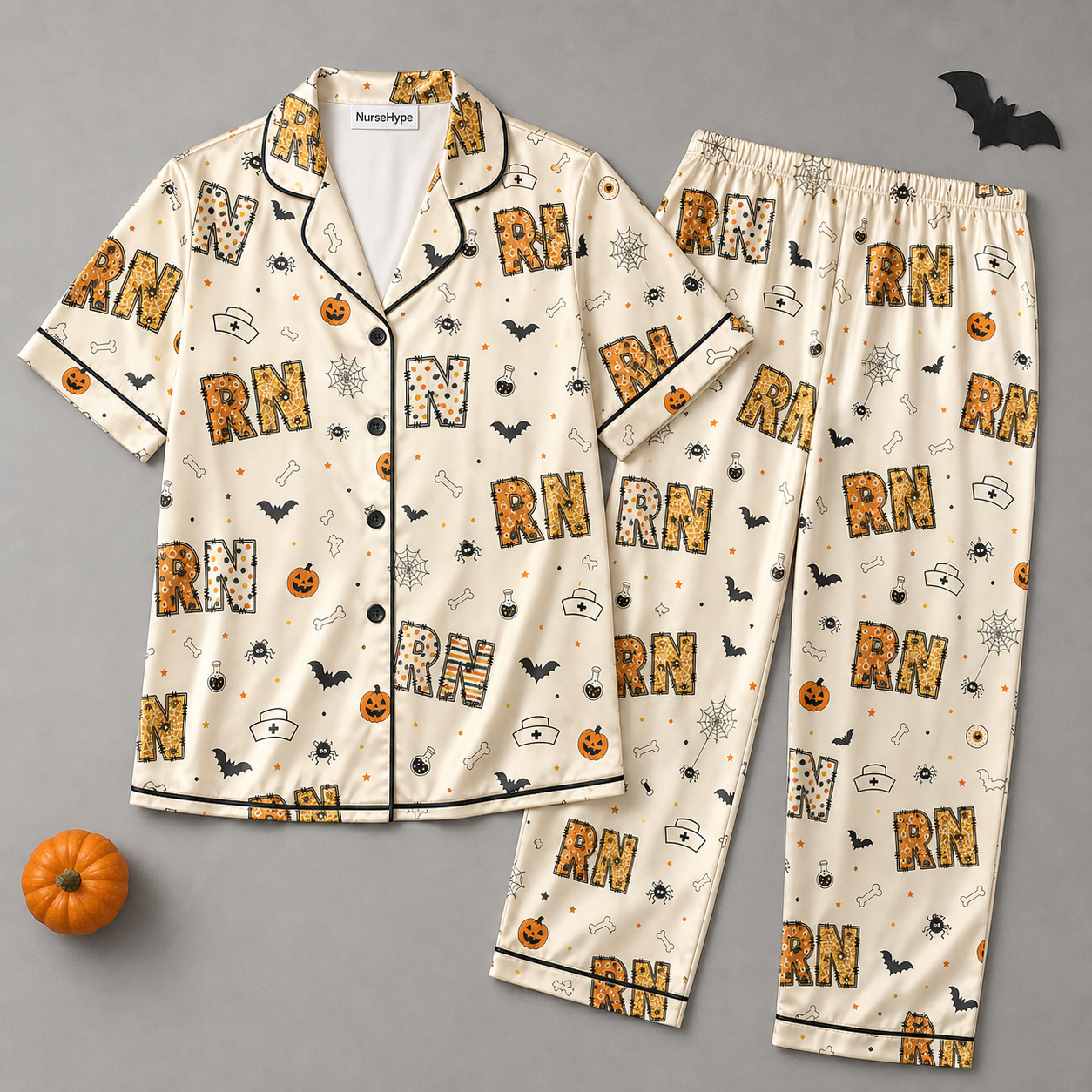 Spooky RN Halloween Pumpkin Nurse Satin Pajama Set - Long flat lay