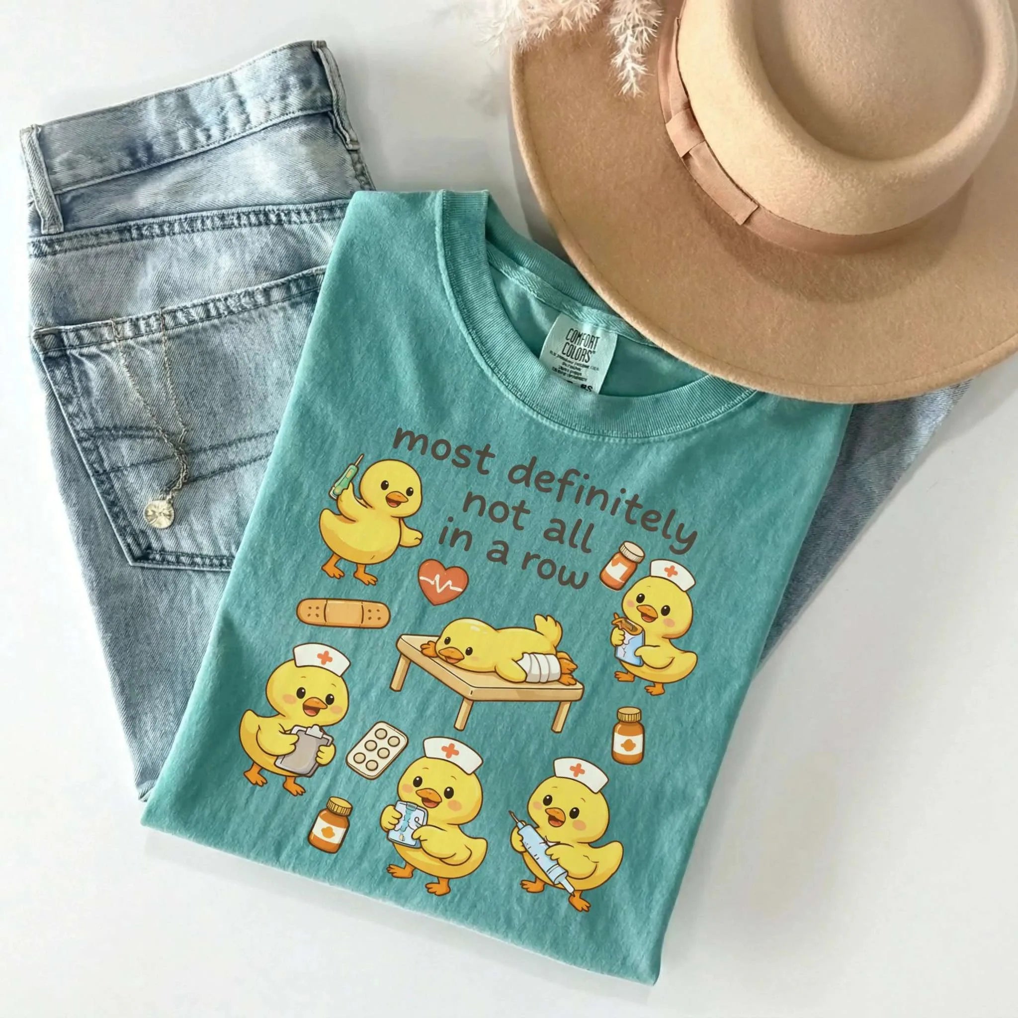 Most Definitely Not All In A Row Nurse Comfort Colors Tee