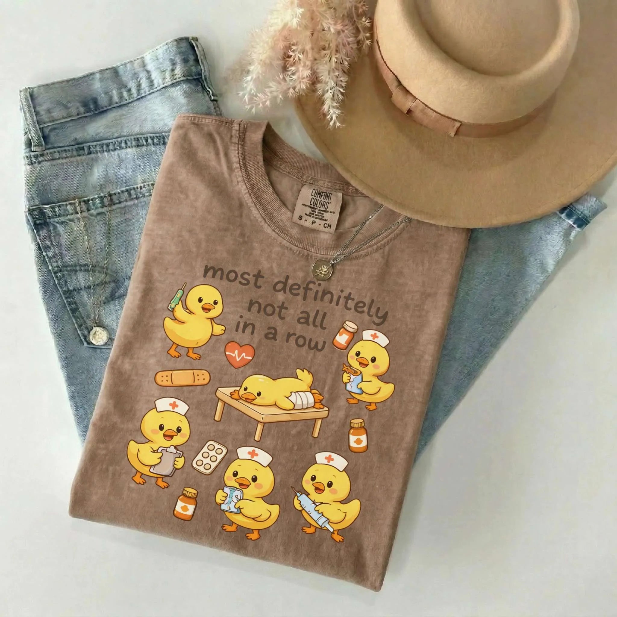 Most Definitely Not All In A Row Nurse Comfort Colors Tee