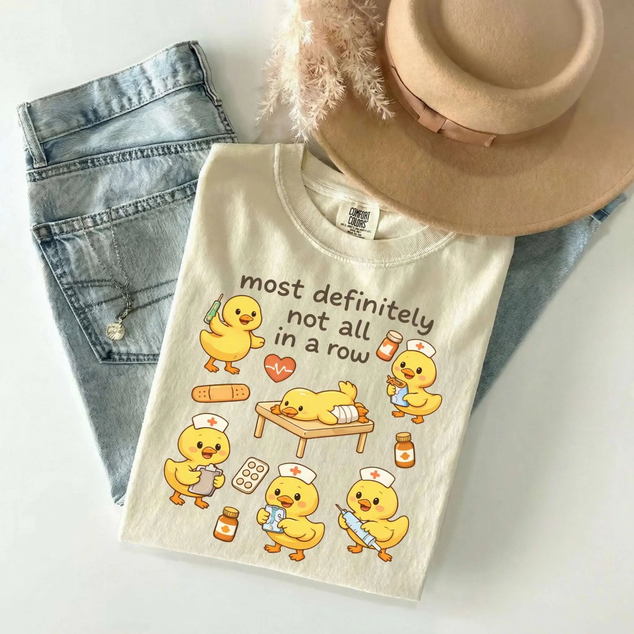 Most Definitely Not All In A Row Nurse Comfort Colors Tee